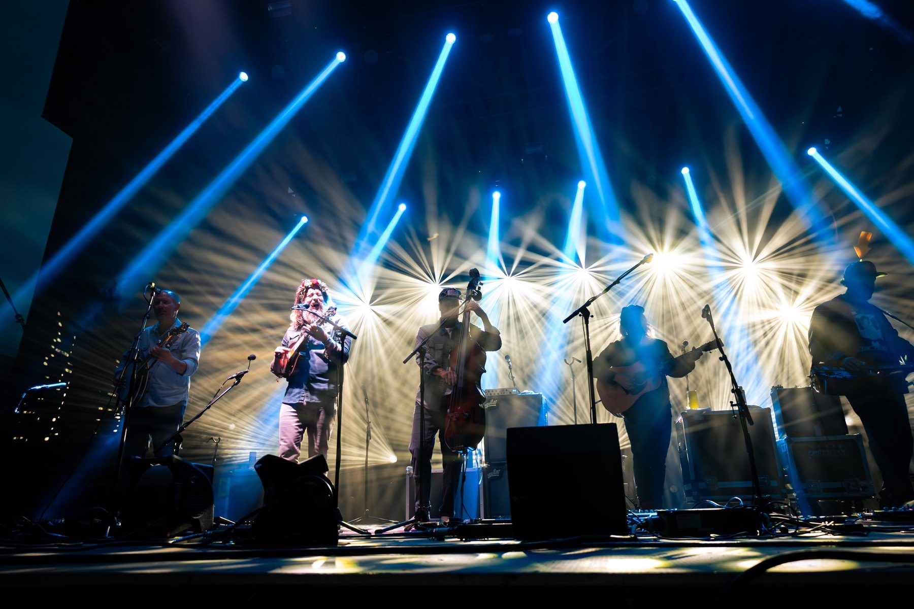 Blue and gold lighting across a live performance